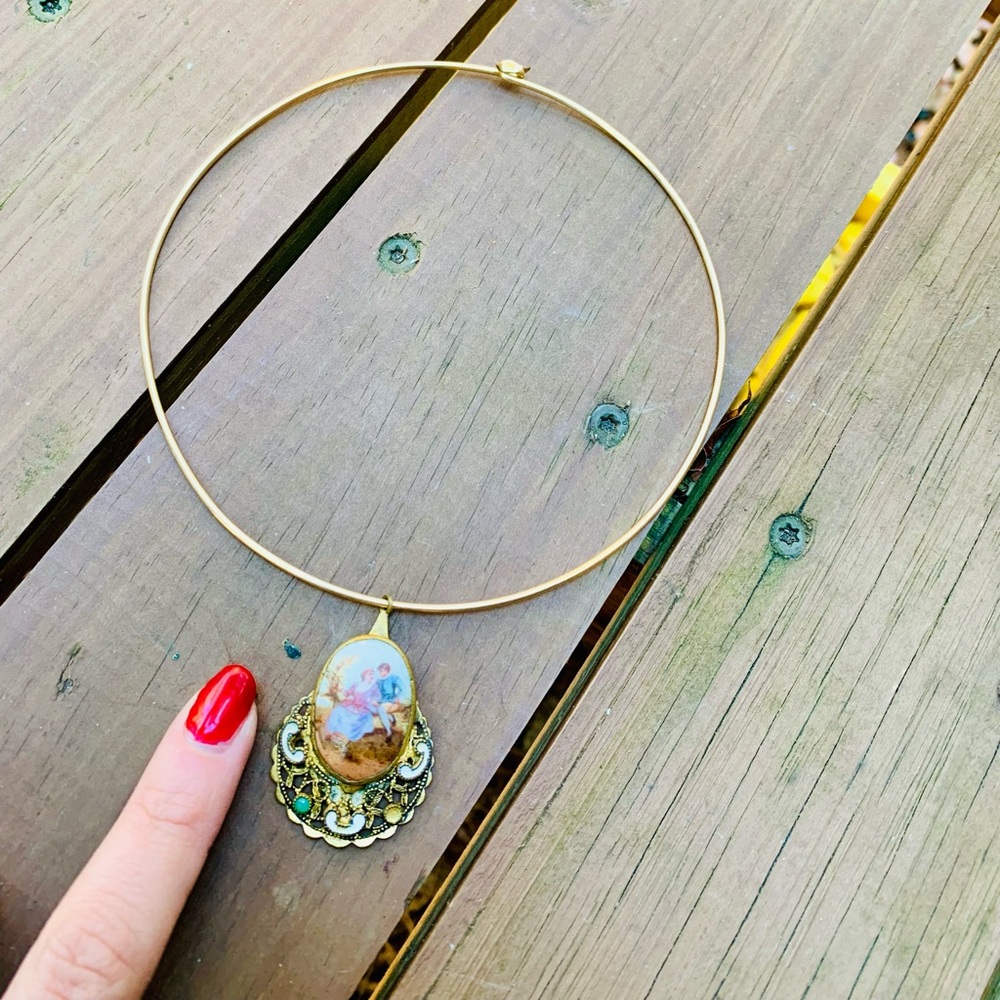 Gold circuit necklace with vintage pendant detail